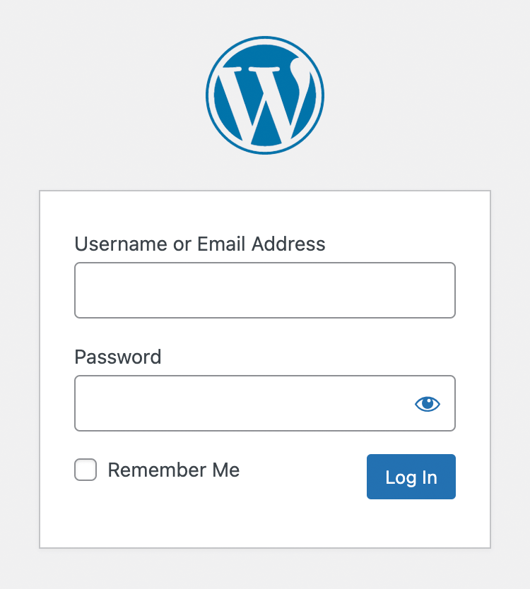 Login form for WordPress showing the WordPress logo, a Username or Email Address label and input, a Password label and input, a Remember Me checkbox, and a Log In button. The Password input has an open eye icon. Screenshot.